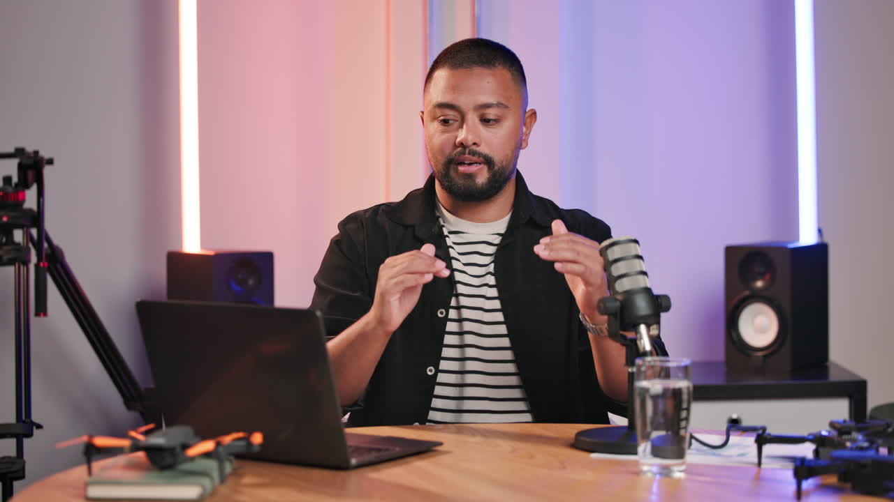 Podcast recording with laptop and drones