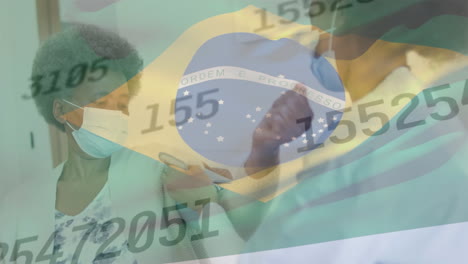 animation of flag of brazil and data processing over african american doctor and patient