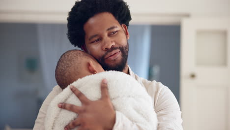 a father lovingly hugs his child