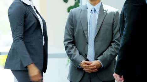 multi ethnic male female business consultancy team handshake