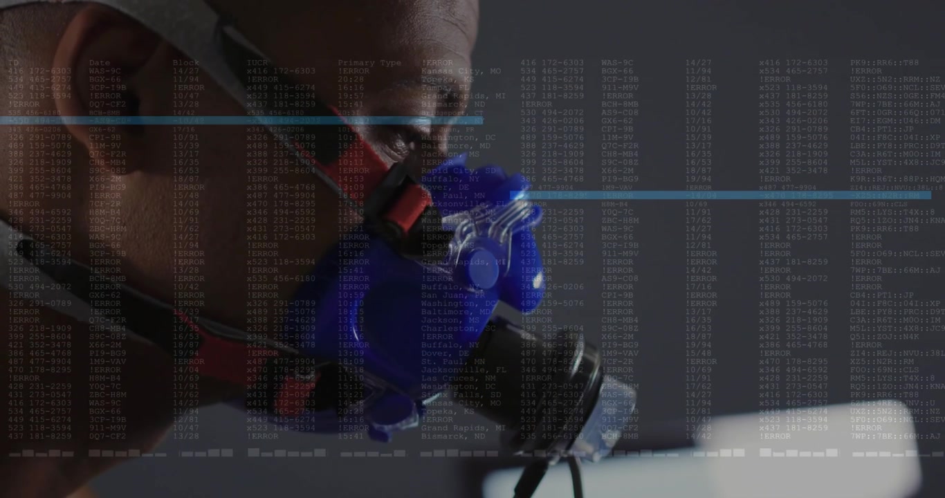 Man with mask watching screen, starting data overlay syncing to tubing and blue scanline for health