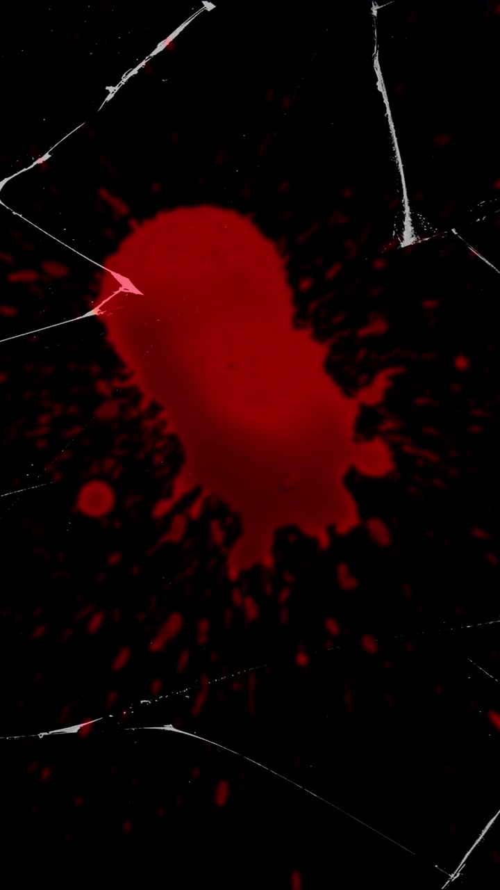 Vertical blood splattering and dripping on cracked glass on black background, seamless loop