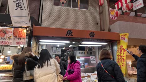 tourists exploring vibrant japanese market street