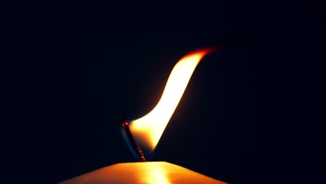 single white candle burning