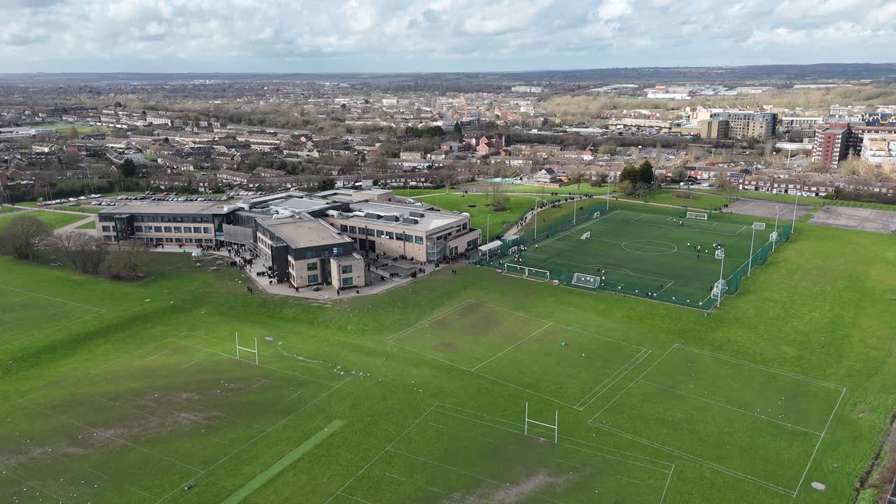 Pull back drone aerial reverse reveal Woodlands School Basildon Essex UK