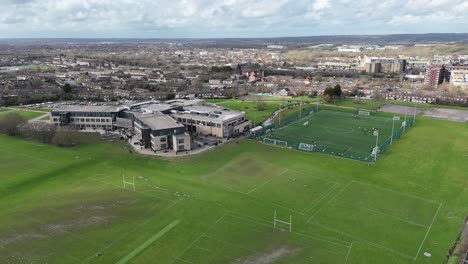 pull back drone aerial reverse reveal woodlands school basildon essex uk