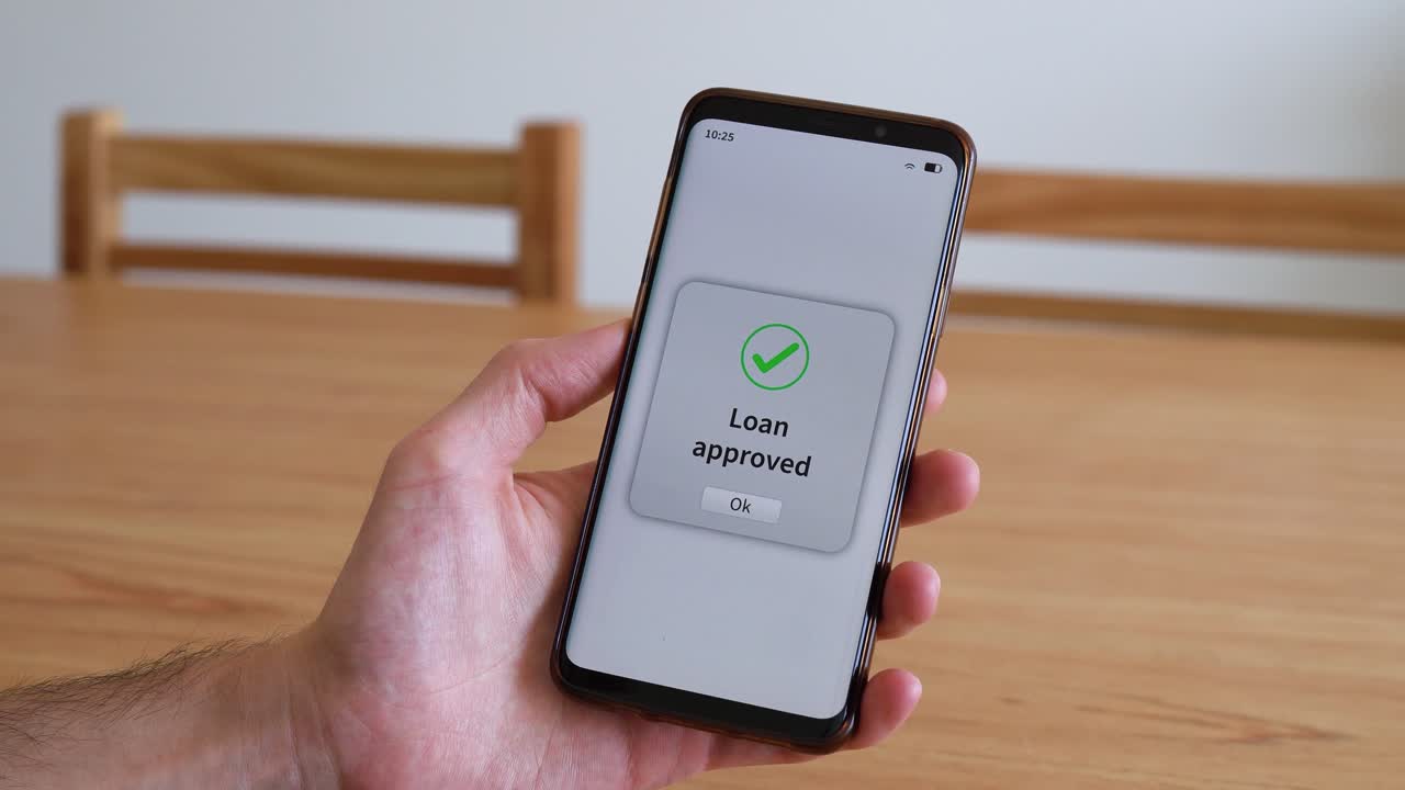 Checking credit score with online app on smartphone. Concept of good credit and loan approval