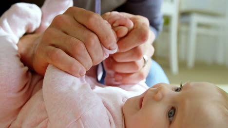 Father-playing-with-his-baby-boy-at-home-4k