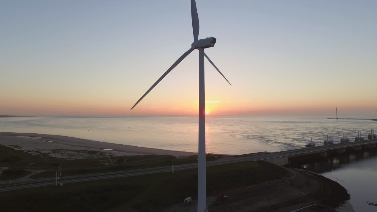 Wind Turbine at Sunset by the Sea