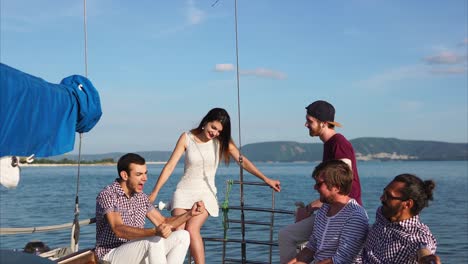 friends having fun on a yacht