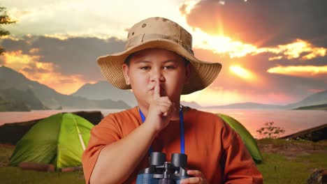 young boy on a camping trip