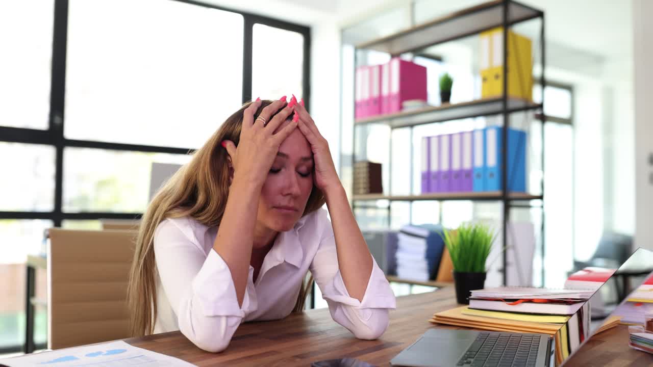 Stressed businesswoman in the office