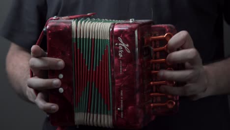 Playing-A-Red-Accordion