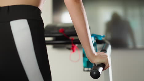 woman working out on a treadmill at the gym