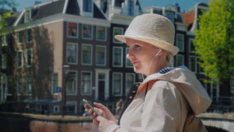 woman with a smartphone in amsterdam