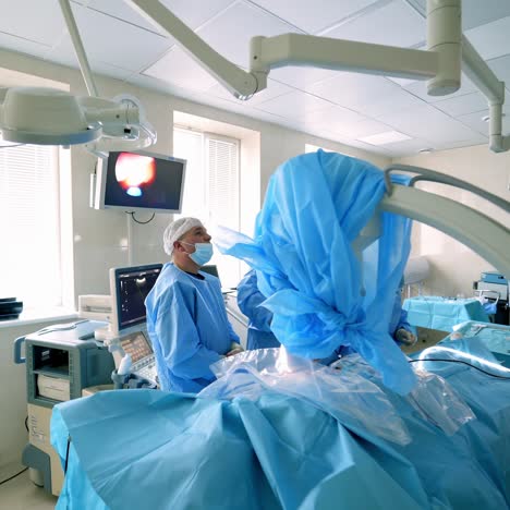 doctor performing surgery in hospital