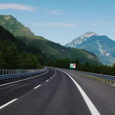 highway near graz austria june 2017: the magnificent highway in austria in the background beautiful alps