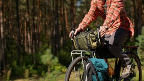 man cycling in the forest