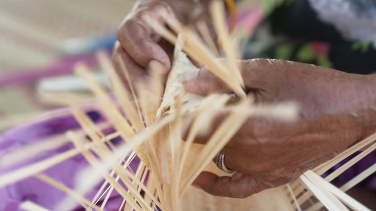 Old Asian Woman Hands Weaving Strips of Bamboo Crafting a Bag, Asian Bamboo Weaving
