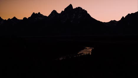 landscape of the grand teton national park in wyoming fading away with the sunset