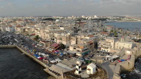 aerial footage over the old city of acre and the mediterranean sea