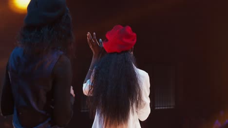 female singers performing on stage