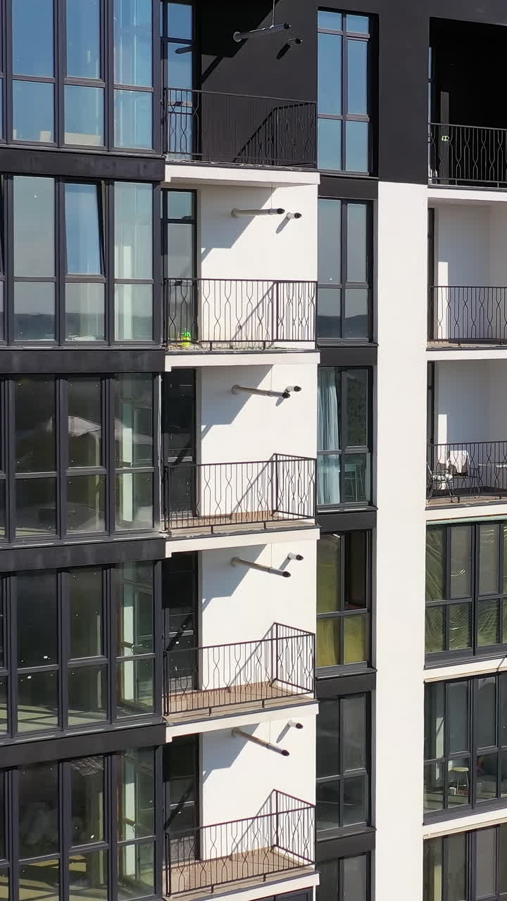 Aerial view of modern residential complex. Building exterior aerial view of new house in city