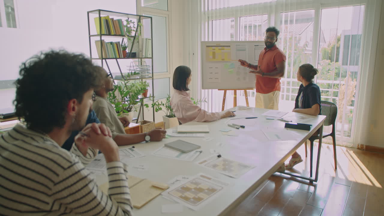 Immigrant Student Speaking by Whiteboard on Lesson
