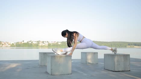 young sporty woman in blue sportswear doing glute bridge exercise on yoga mat attractive girl in trendy activewear has workout and training butt muscle athletic female in blue sportswear doing glute bridge exercise on yoga mat and training buttocks muscles