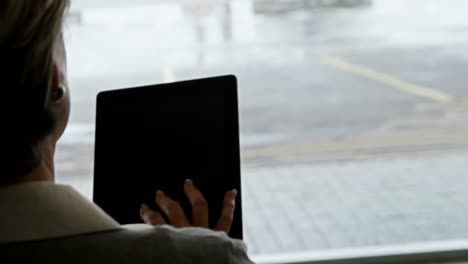 businesswoman using a digital tablet