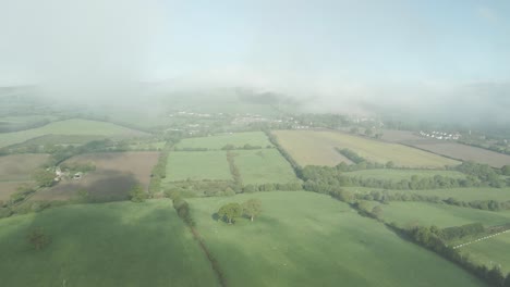 Economized-irish-farmlands-misty-mornings-at-Wexford-Ireland-aerial