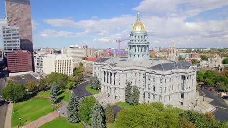 low drone rising shot of the colorado state capital building in downtown denver, colorado,usa on a fall day