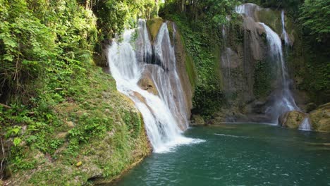 4k drone video flying towards pahangog falls in bohol, philippines