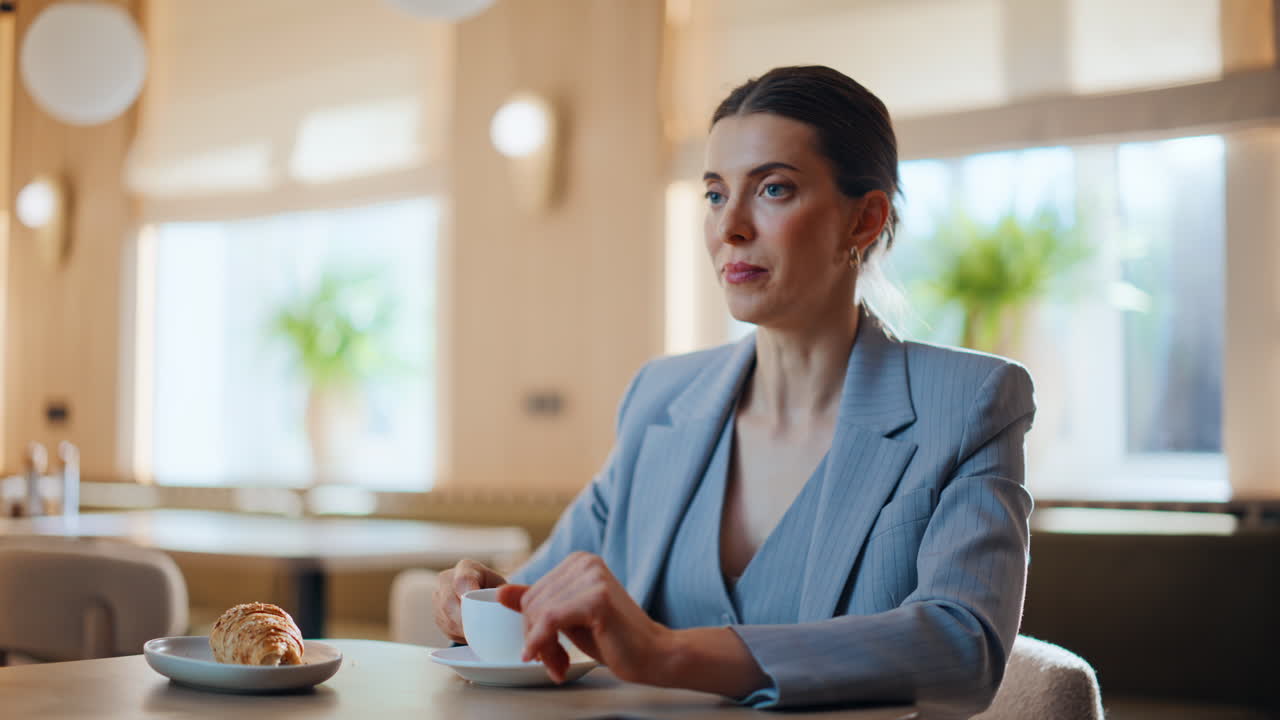Happy lady dining cafe alone closeup. Relaxed elegant businesswoman eating lunch