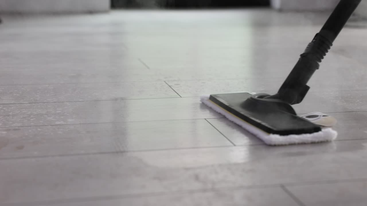 Steam Mop Cleaning a Tiled Floor