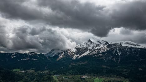 clouds forming over alps mountain bavaria germany, arial drone timelapse