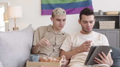 Couple Watching Movie and Having Snack