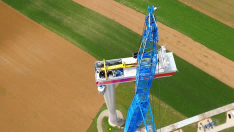 View-From-Above-Of-Technicians-Inside-Nacelle-Atop-The-Tower-Of-A-Wind-Turbine