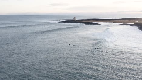 popular surf spot near þorlákshöfn in cold atlantic ocean water, aerial