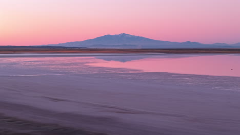 aerial view of salinas del diamante national protected area and open-air salt flat at sunset, mendoza, argentina.
