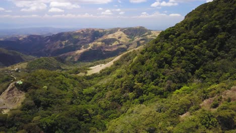 Two-different-states-of-a-forest-in-the-same-frame:-dry-and-rainforest-parts