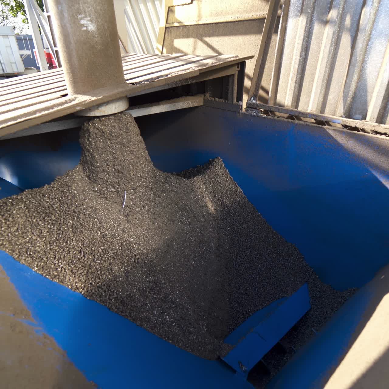 Grains on the industrial plant. Factory for keeping and processing agricultural products. Industrial equipment with compound feed