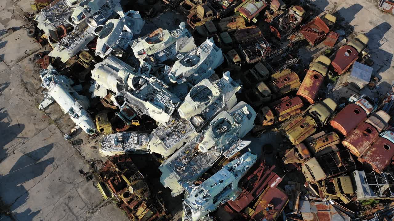 Buriakivka Radioactive Vehicle Graveyard Near Pripyat In The Chernobyl Exclusion Zone, Ukraine. Aerial Rotating Shot