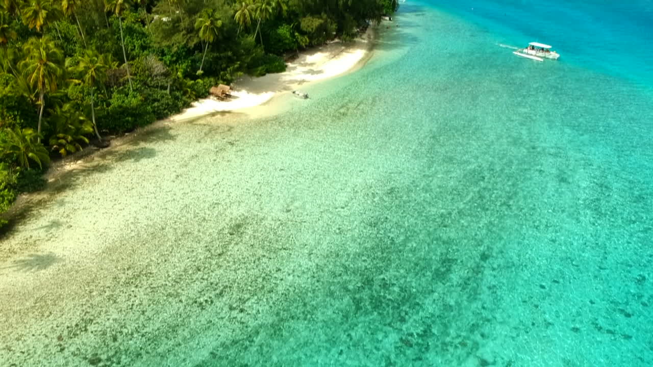 Aerial view of the lagoon of Moorea with the deep blue ocean in the background, Moorea, French Polynesia