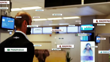 animation of social media notifications over biracial businessman walking with case at airport