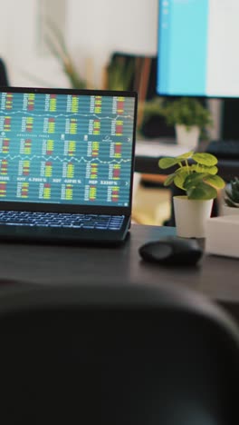 vertical video business analytics files and notebook on desk in company workplace