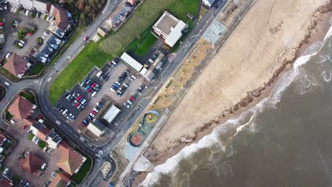 aerial shot of waves crashing against roker beach