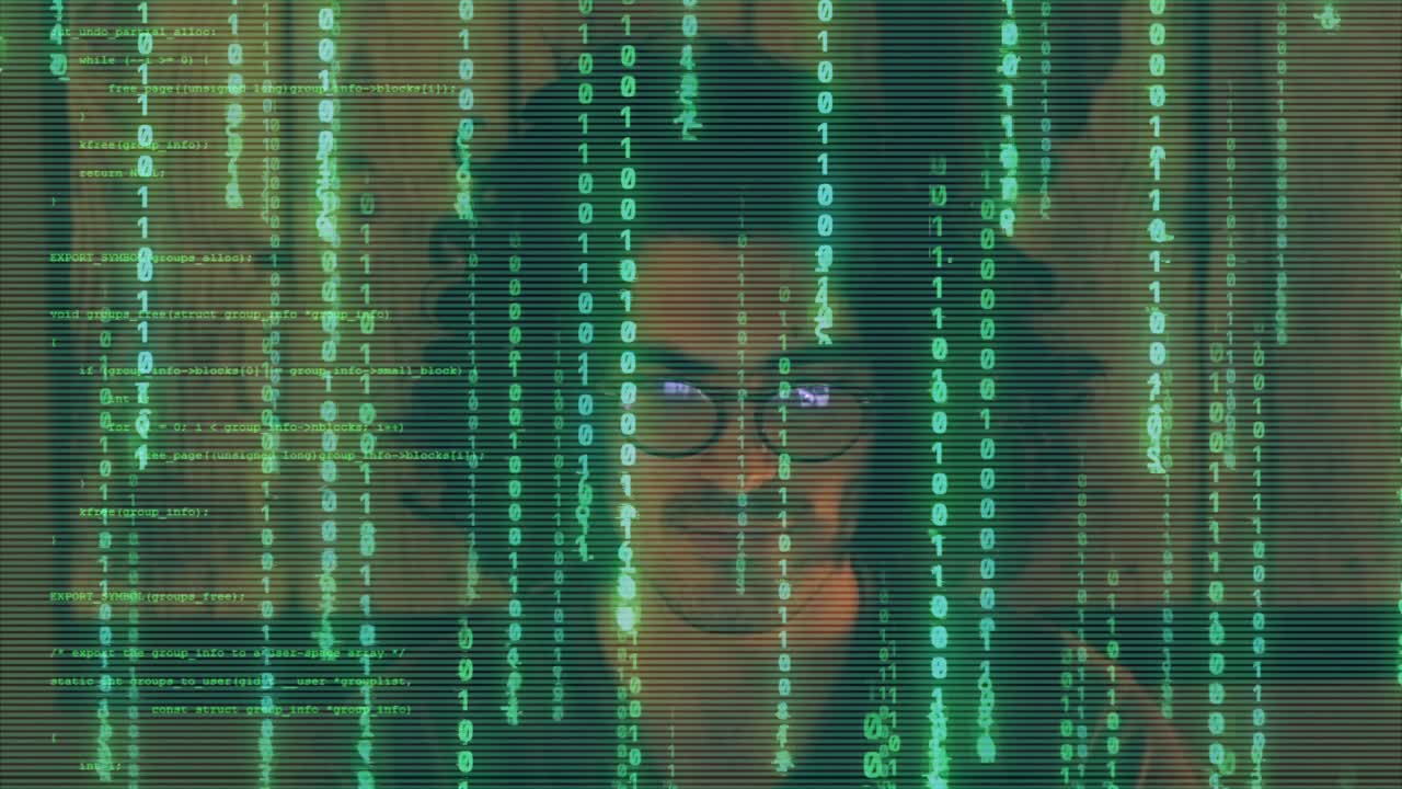 Man with glasses surrounded by green binary code. Hacker or cybersecurity expert at work