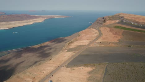 Aerial-view-along-the-majestic-mountain-peaks,-Isla-Graciosa,-Lanzarote,-Canary-Island