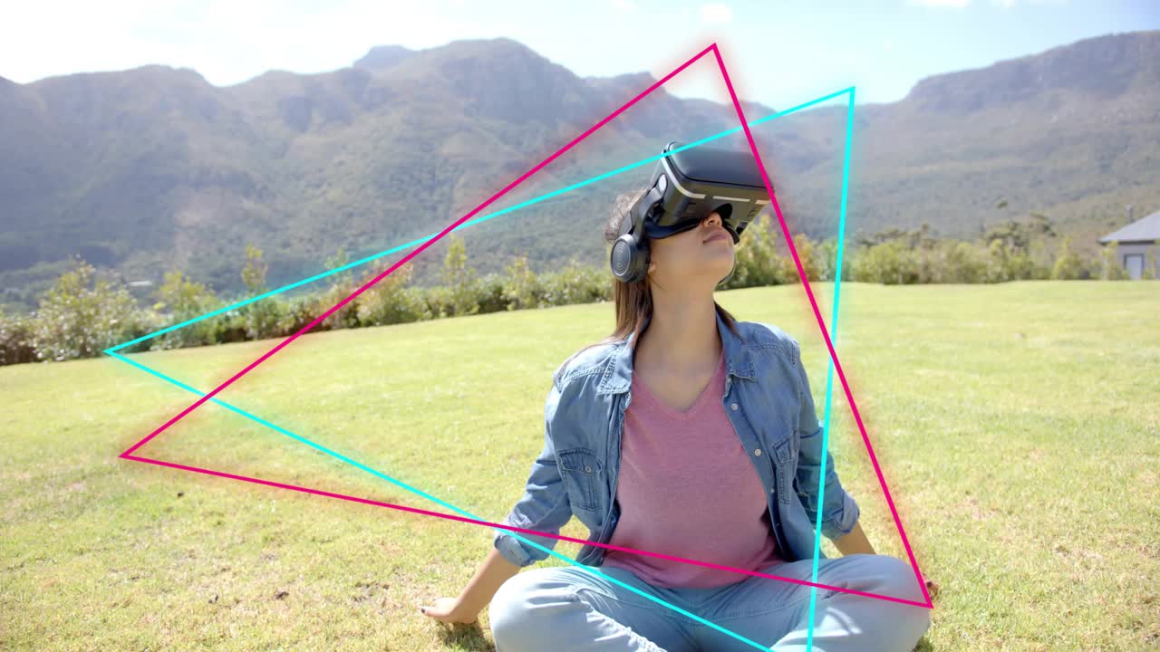 Teenage female starting VR session, exploring virtual scene while cyan magenta triangles rotating